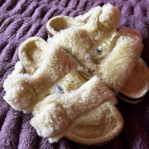 Yellow Fuzzy Birkenstock Sandals
Women’s size 8